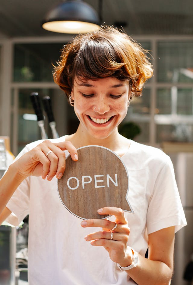 Woman-open-sign