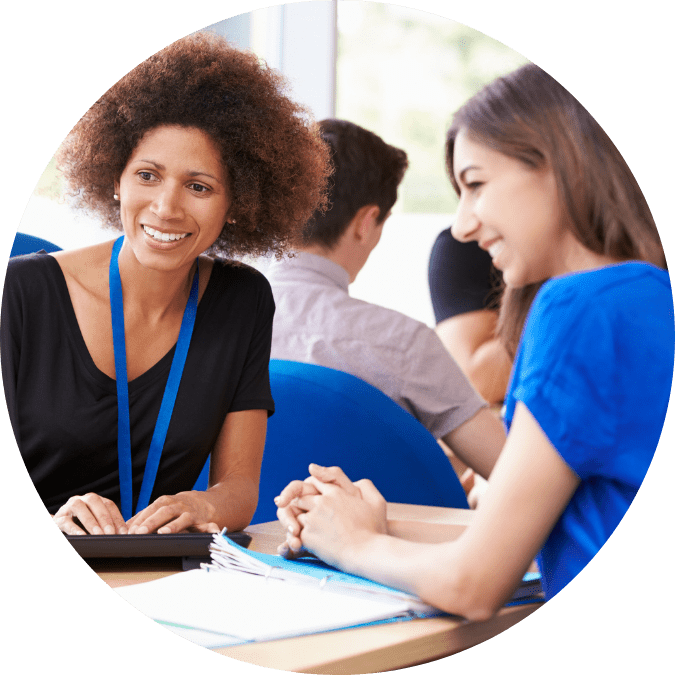 Woman speaking to student - digital marketing higher ed
